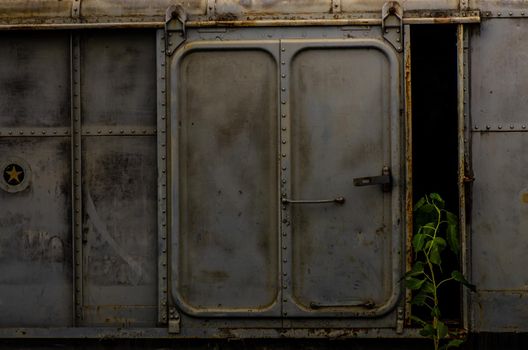 Vintage railroad container doors without rusty and old color at station, Door of old railroad bogie.