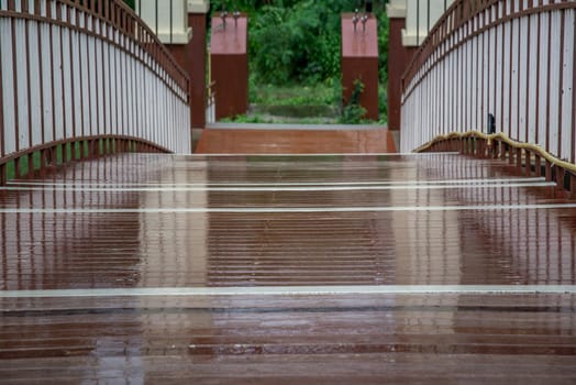 Close-up shots the wood Bridge floor after rain with reflection of lights. copy space.