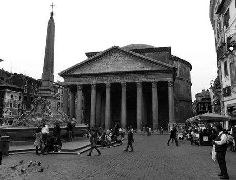 A view of the Pantheon at Rome with a fountain and an obelisk in the foreground