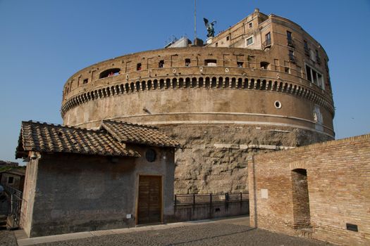 Wide-shot of Saint Michael's Castle at Rome against a clear blue sky