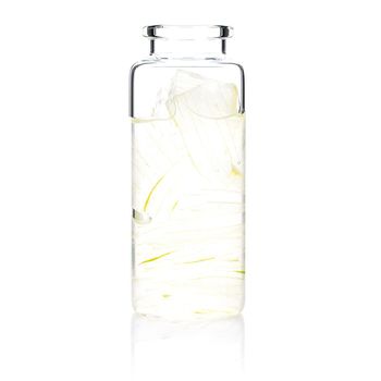 Homemade skin care with aloe vera gel in a glass bottle isolated on white background.