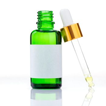  Essential oil bottles with dropper and bubble isolated on white background.