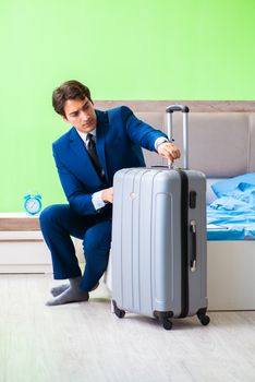 Businessman working in the hotel room