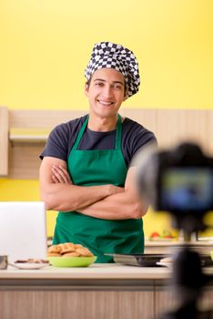 Young chef blogger explaining food preparation  