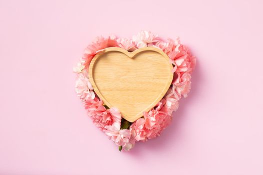 Heart wood with carnation flowers for Mother's Day and Valentines Day