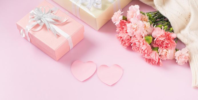 Gift box with carnation flowers, Mother's Day and Valentines Day concept