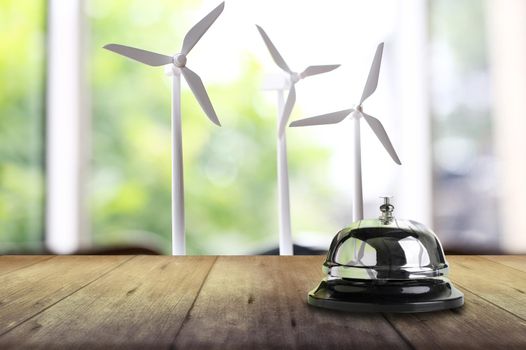 Bell service turbine on wood table, Nature energy concept