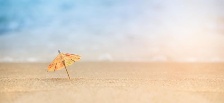 Beach mini umbrella with copy space, Summer on the beach concept