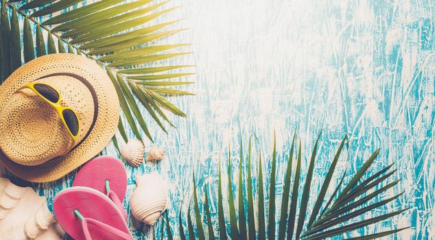 Beach hat, coconut leaves and glasses on pink background In the summer concept, copy space, top view, minimal style, Glasses beach