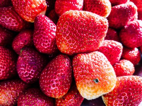 background from freshly harvested strawberries, directly above