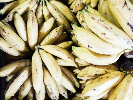 Bananas island background, yellow color, concept photo for kitchen decoration