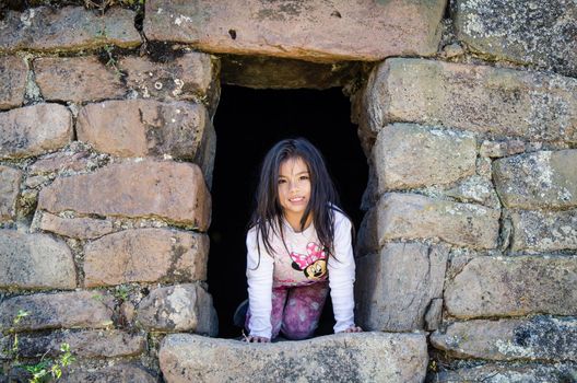 Tourist girl doing treks for pumacoto funerals in Canta - Peru