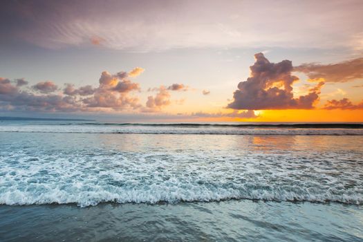 Amazing sunset from Bali Double Six beach surf waves and colorful clouds