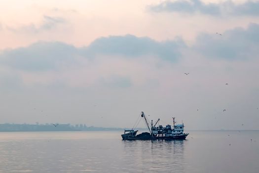 istanbul,turkey-april 2,2021. fishing season and fishing boats at marmara sea in kumkapi district.