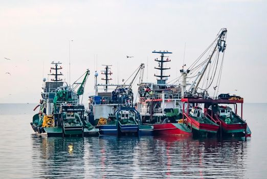 istanbul,turkey-april 2,2021. fishing season and fishing boats at marmara sea in kumkapi district.