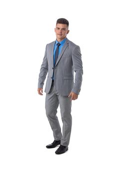 Full length portrait of a young business man in gray suit isolated on white background