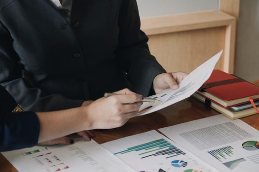 Close up Business people meeting to discuss the situation on the market. Business Financial Concept
