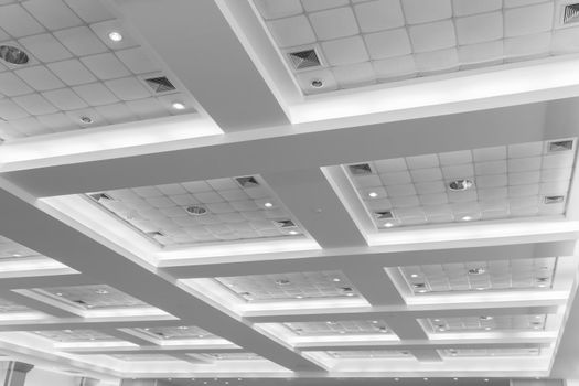 ceiling of business interior office building and light neon. style monochrome with copy space add text