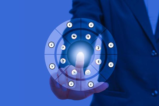 businessman pressing modern social buttons on social network interface with finger hand touch technology icon on blue background and copy space add text