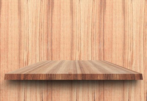 Empty top wooden shelves and woody wall background. For product display with copy space add text