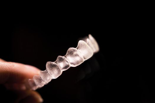 Transparent ferule retainer teeth alignment. Copy space