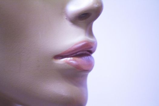 Portrait of female lips of a mannequin. No people