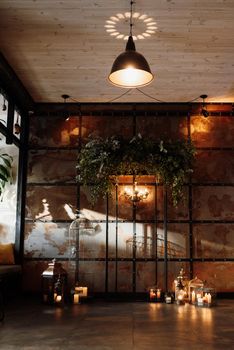 wedding ceremony area in brown oothenes with wood and rusty metal