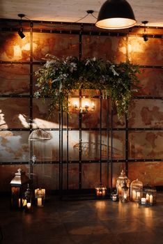 wedding ceremony area in brown oothenes with wood and rusty metal