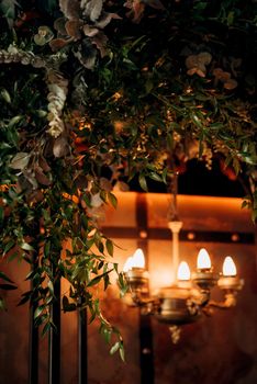 wedding ceremony area in brown oothenes with wood and rusty metal