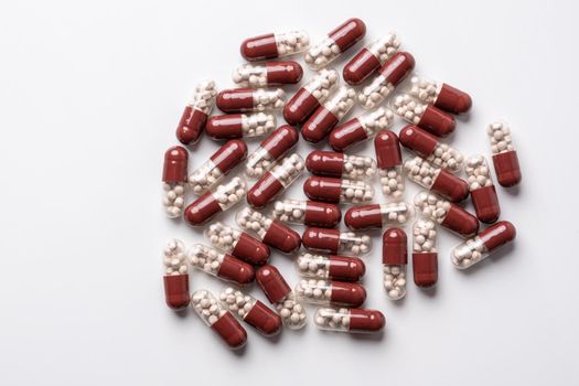 medicine medical preparation in capsules on a white background. High quality photo