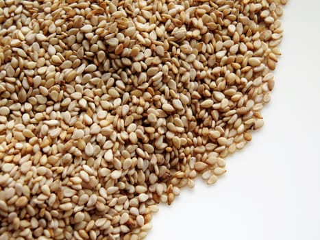 background of sesame seeds on a white background