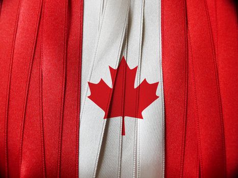 Canada flag or banner made with red and white ribbons