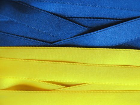 UKRAINE flag or banner made with blue and yellow ribbons