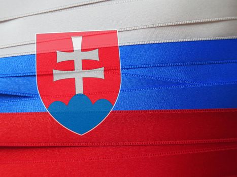 Slovakia flag or banner made with red, blue and white ribbons