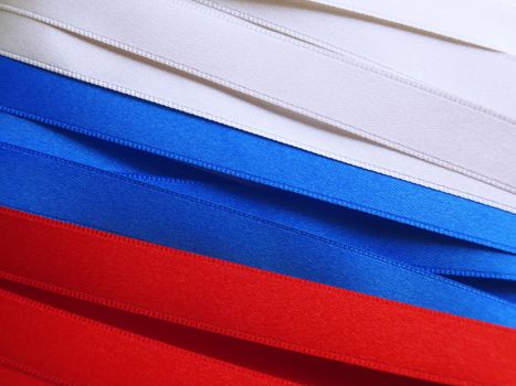 Russia flag or banner made with red, blue and white ribbons