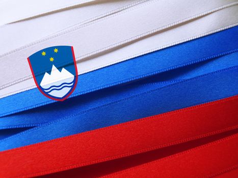 Slovenia flag or banner made with red, blue and white ribbons