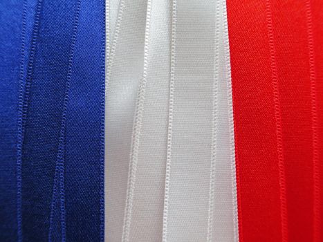 France flag or banner made with red, blue and white ribbons