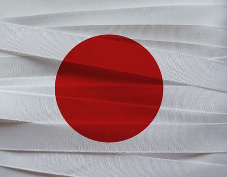 Japan flag or banner made with white and red ribbons