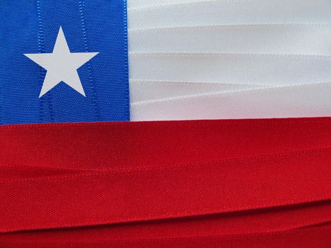 Chile flag or banner made with red, blue and white ribbons