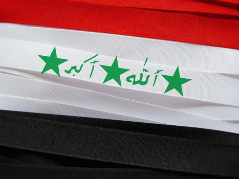 Iraq flag or banner made with red, white and black ribbons