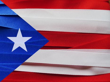 Puerto Rico flag or banner made with red, blue and white ribbons