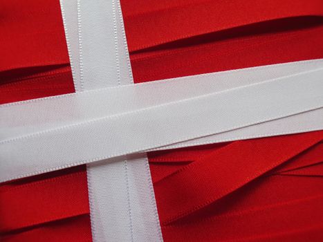 Denmark flag or banner made with red and white ribbons