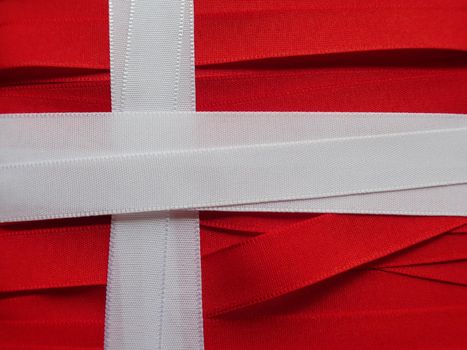 Denmark flag or banner made with red and white ribbons