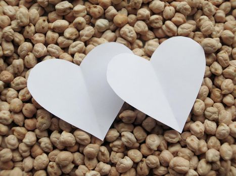 White Heart shape on pattern of chickpeas. healthy food