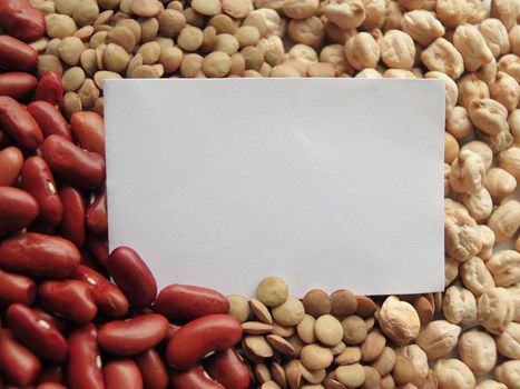 White tag on Raw Red Beans, lentils and chickpeas Background. healthy food