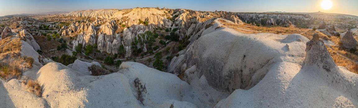 The picturesque panorama of Cappadocia at sunset, amazing Turkey, Mountains and rock formation, big size image, Goreme national park, Love valley, open air museum, ancient region of Anatolia, Unesco. High quality photo