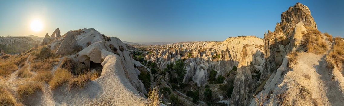 The picturesque panorama of Cappadocia at sunset, amazing Turkey, Mountains and rock formation, big size image, Goreme national park, Love valley, open air museum, ancient region of Anatolia, Unesco. High quality photo