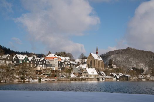 Panoramic image of Beyenburg close to Wuppertal on a winter day with snow covered landscape, Bergisches Land, Germany