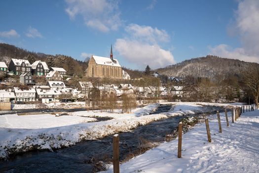 Panoramic image of Beyenburg close to Wuppertal on a winter day with snow covered landscape, Bergisches Land, Germany