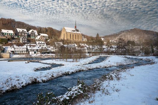 Panoramic image of Beyenburg close to Wuppertal on a winter day with snow covered landscape, Bergisches Land, Germany